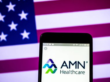 Kiev, Ukrayna - 17 Şubat 2019: Amn Sağlık Hizmetleri A.ş logo akıllı telefon görüntülenen gördüm