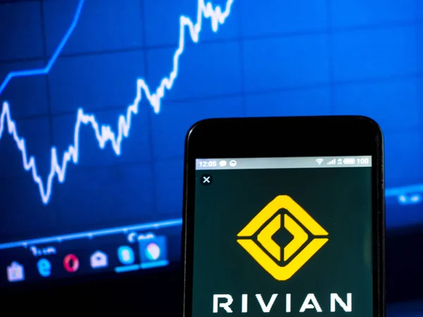 Rivian Automotive company logo seen displayed on smart phone — Stock Photo, Image