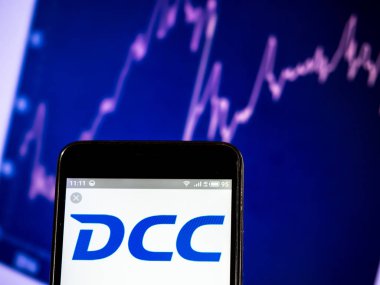 Kiev, Ukrayna - 7 Mart 2019: Dcc plc şirket logosu akıllı telefon görüntülenen gördüm.