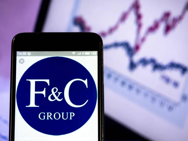 F&C Group of Companies logo seen displayed on smart phone. — Stock Photo, Image