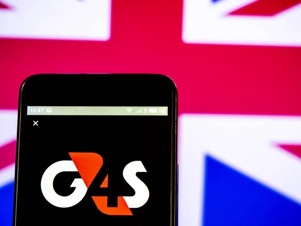 G4s plc 회사 로고는 스마트 폰에 표시 된 볼. — 스톡 사진