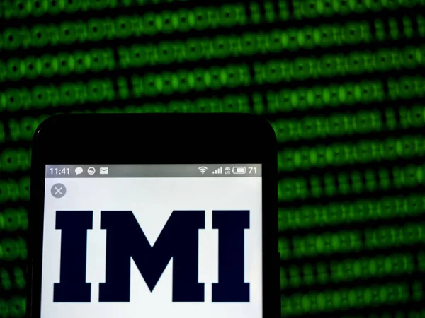Az IMI plc cég logója látható megjelenített szúró telefon. — Stock Fotó