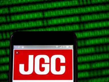 JGC şirket logosu akıllı telefon görüntülenen gördüm.