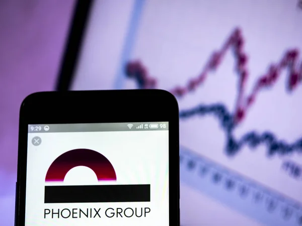 Phoenix Group Holdings logotipo visto exibido no telefone inteligente . — Fotografia de Stock