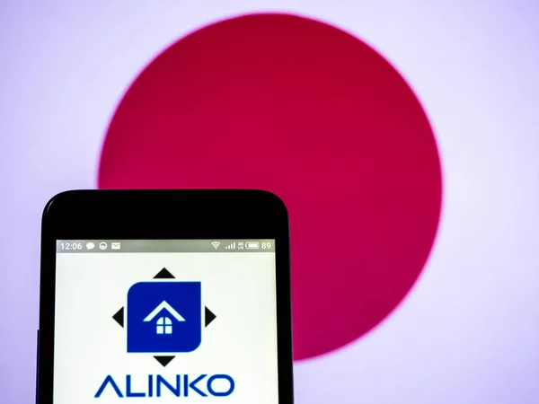 Alinco bedrijfslogo gezien weergegeven op smart phone. — Stockfoto