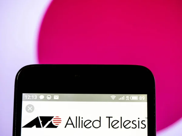 연합 하는 Telesis 회사 로고 본 스마트 폰에 표시. — 스톡 사진