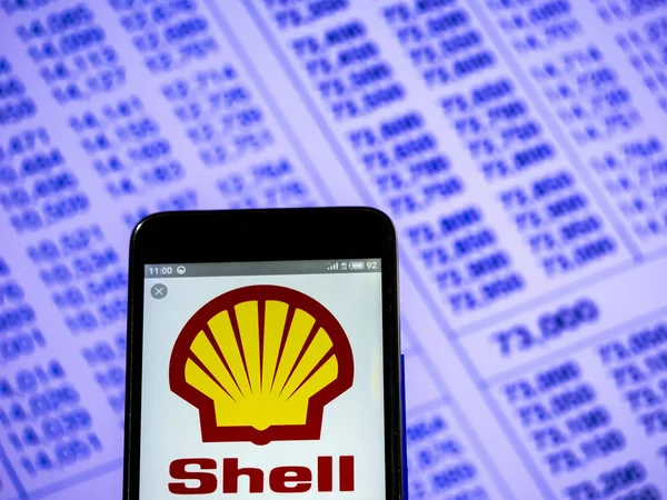 Royal Dutch Shell company logo seen displayed on smart phone. — Stock Photo, Image