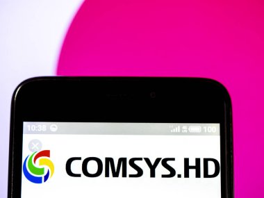  Comsys Holding Şirket logosu akıllı telefon görüntülenen gördüm.