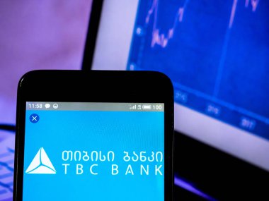 Poto resimde görülen bir Tbc banka grubu plc logo görüntülenen bir 