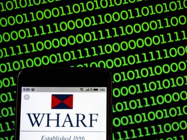 Fotoğraf illüstrasyon görülen bir Wheelock ve Co logo bir zeki üzerinde görüntülenir.