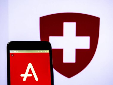 Fotoğraf illüstrasyon görülen Adecco grup logosu bir sma üzerinde görüntülenir.