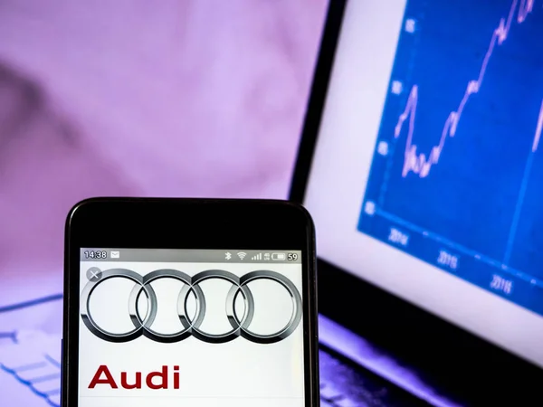 In this photo illustration an Audi AG  logo seen displayed on a — Stock Photo, Image