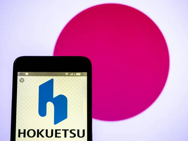 Nesta foto ilustração um logotipo Hokuetsu Corporation visto disp — Fotografia de Stock