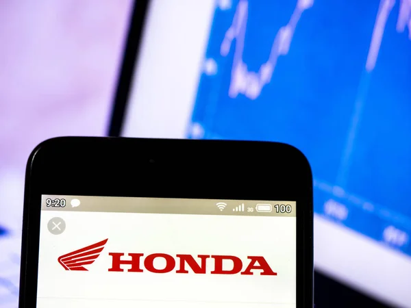 Nesta foto ilustração um Honda Motor Co., Ltd. logotipo visto dis — Fotografia de Stock