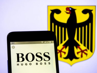 Bu fotoğraf resimde bir Hugo Boss AG logosu görüntülenen görüldü