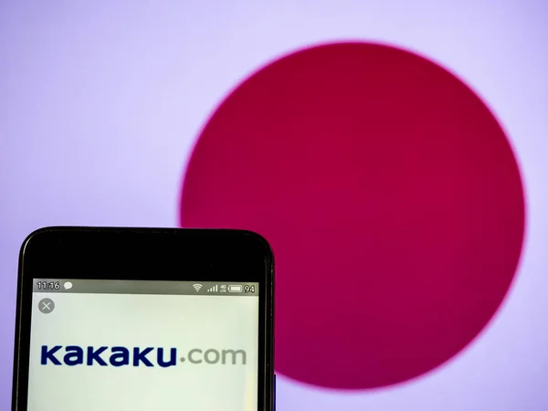 In this photo illustration a Kakaku.com, Inc.  logo seen display — Stock Photo, Image