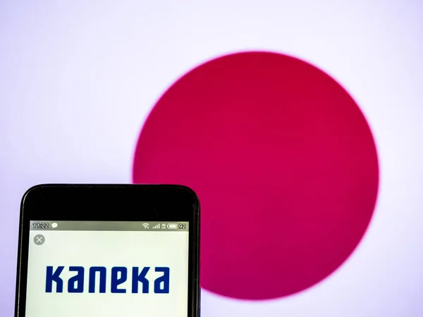 In this photo illustration a Kaneka Corporation  logo seen displ — Stock Photo, Image