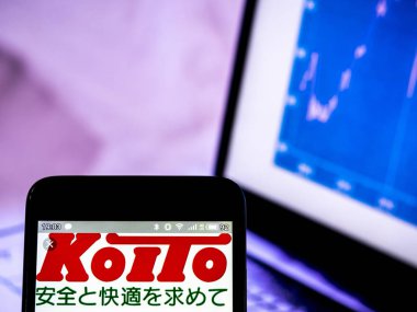 Bu fotoğraf illüstrasyon bir Ki Holdings Co, Ltd logosu görülen dis