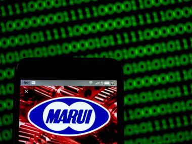 Bu fotoğraf illüstrasyon bir Marui Co, Ltd logosu görüntülenen görüldü