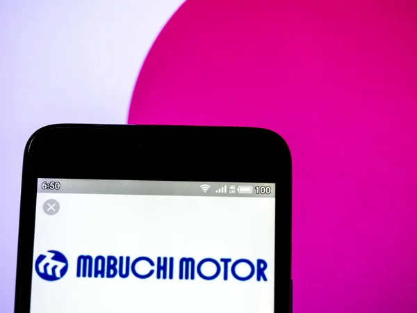 I detta foto illustration en Mabuchi Motor Company logo sett dis — Stockfoto