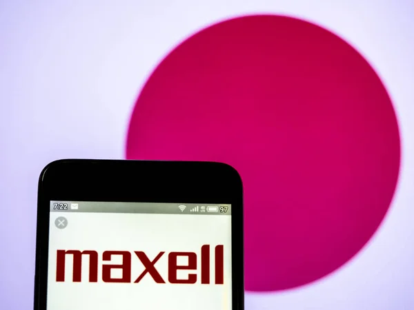 In deze foto illustratie een Maxell Holdings, Ltd. logo gezien DIS — Stockfoto