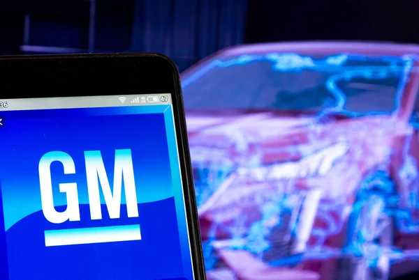 In this photo illustration the General Motors Company logo is se — Stock Photo, Image