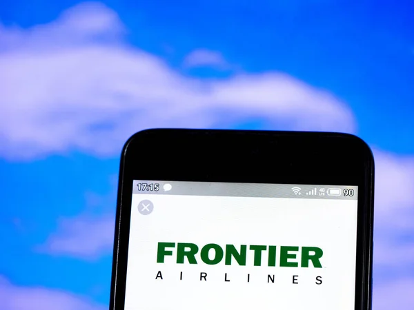 In this photo illustration the Frontier Airlines logo is seen di — Stock Photo, Image
