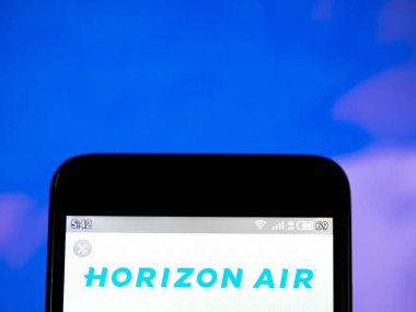 Bu fotoğraf resimde Horizon Air Industries, Inc logosu