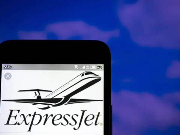 In this photo illustration the ExpressJet Airlines, Inc. logo is — Stock Photo, Image