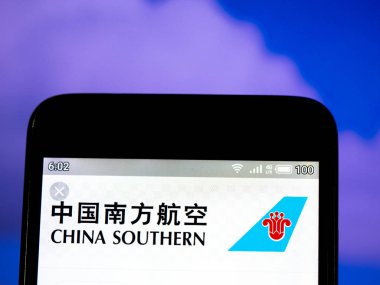 Bu fotoğraf resimde Çin Southern Airlines logosu s