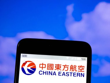 Bu fotoğraf resimde Çin Eastern Airlines logosu se