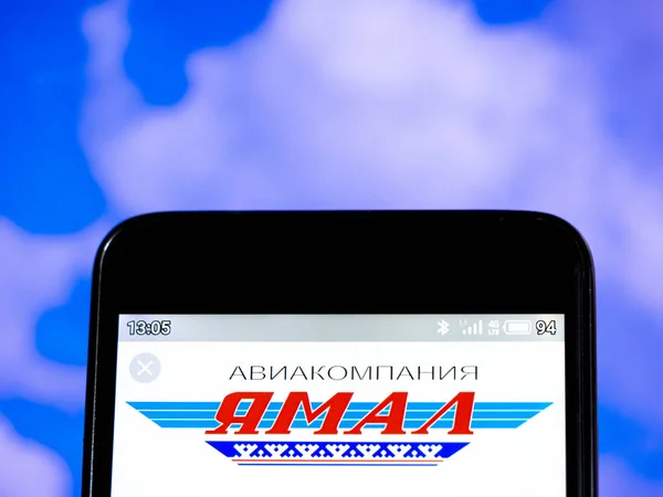 Nesta foto ilustração o logotipo da Yamal Airlines é visto displ — Fotografia de Stock