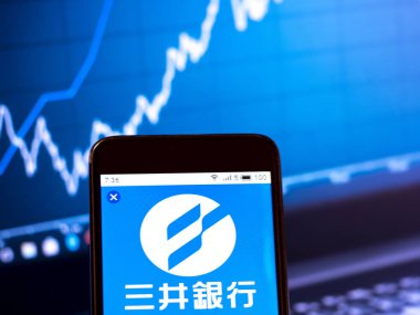 Bu fotoğraf illüstrasyonda Mitsumi Bank logosu ekran görülür