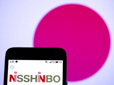 Bu fotoğraf illüstrasyonda Nisshinbo Holdings Inc. logosu