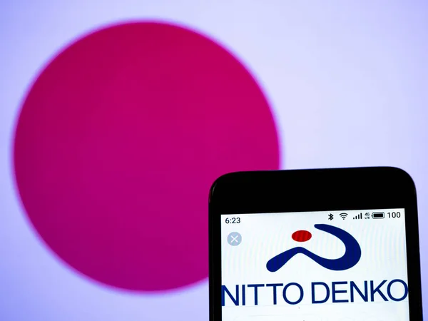 In deze foto illustratie is het logo van Nitto Denko Corporation s — Stockfoto