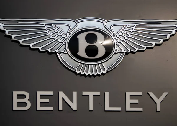 Sign at the entrance of a Bentley store — Stock Photo, Image