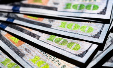 100 dolarlık banknotların arkaplanı