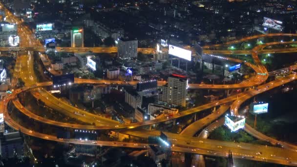 Geceleri ışıklı yollarda Havadan görünümü Bangkok — Stok video