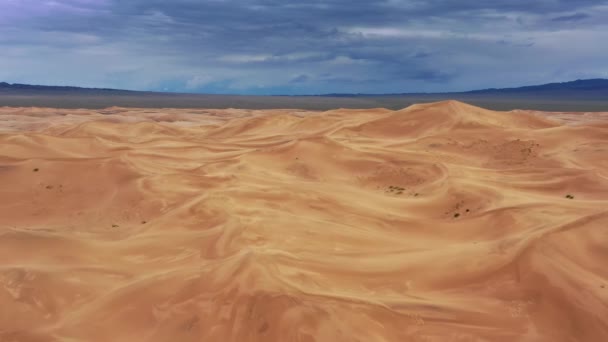 Aerial view on sand dunes with storm clouds — ストック動画