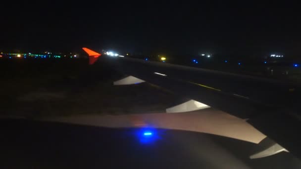 View Aircraft Wing Flashing Lights Night — Stock Video