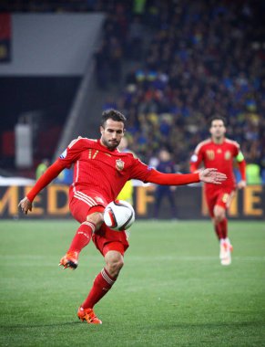 Kiev, Ukrayna - 12 Ekim 2015: Mario Gaspar İspanya Ukrayna Kiev Nsk Olimpiyskyi Stadyumu'nda karşı Uefa Euro 2016 yeterlik oyun sırasında top başladı. İspanya 1-0 kazandı