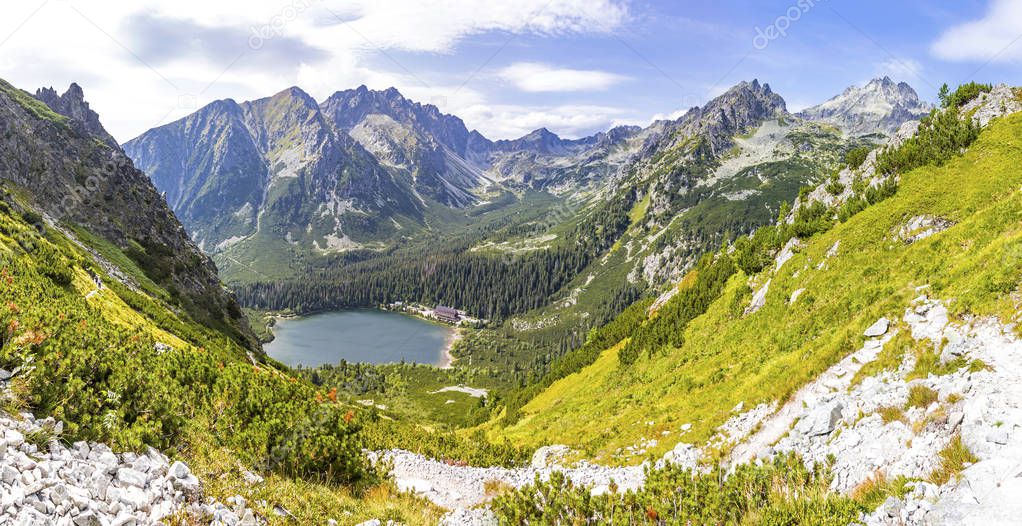 Panorama of mountain lake of glacial Popradske Pleso (1494m) in High Tatras mountains, Slovakia. Picturesque view during the trekking to Sedlo pod Ostrvou (1966m)