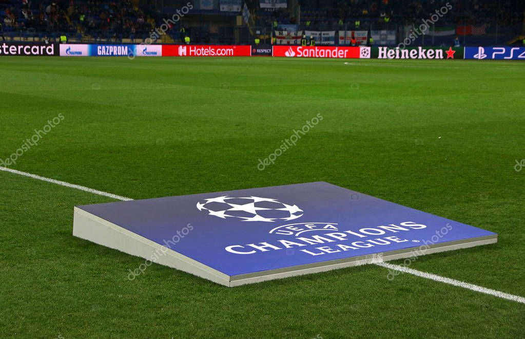 KHARKIV, UKRAINE - OCTOBER 23, 2018: UEFA Champions League signboard on the pitch of OSK Metalist stadium in Kharkiv before the UEFA Champions League game Shakhtar Donetsk v Mancester City