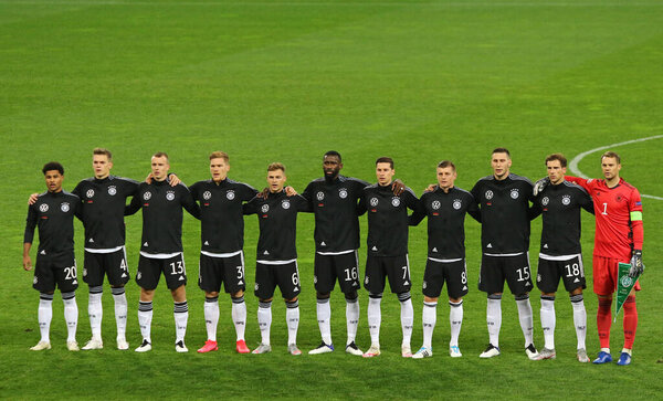 KYIV, UKRAINE - OCTOBER 10, 2020: German players listen to the National Anthem before the UEFA Nations League game Ukraine v Germany at NSK Olimpiyskiy stadium in Kyiv, Ukraine