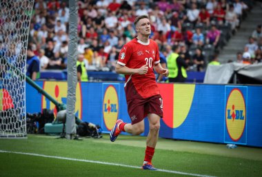 Berlin, Germany - June 29, 2024: Michel Aebischer of Switzerland (#20) in action during the UEFA EURO 2024 Round of 16 game Switzerland v Italy at Olympiastadion in Berlin, Germany