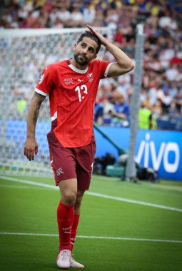 Berlin, Germany - June 29, 2024: Ricardo Rodriguez of Switzerland (#13) in action during the UEFA EURO 2024 Round of 16 game Switzerland v Italy at Olympiastadion in Berlin, Germany
