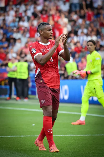 Berlin, Germany - June 29, 2024: Manuel Akanji of Switzerland (#5) thanks fans after the UEFA EURO 2024 Round of 16 game Switzerland v Italy at Olympiastadion in Berlin, Germany
