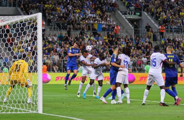 Wroclaw, Poland - September 5, 2025: Ukrainian (in Blue) and France players fight for a ball during their FIFA World Cup 2026 Qualifying round game at Tarczynski Arena in Wroclaw