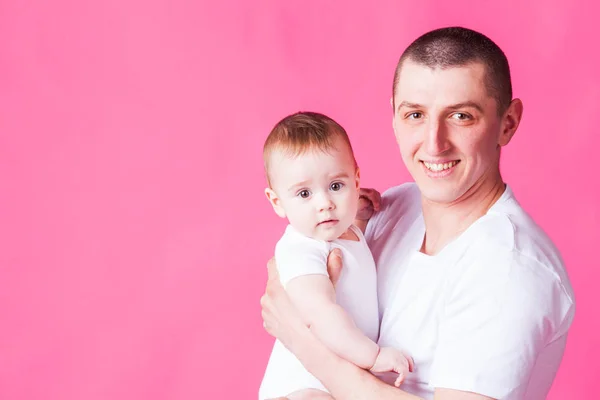 Young father holding newborn baby — Stock Photo, Image