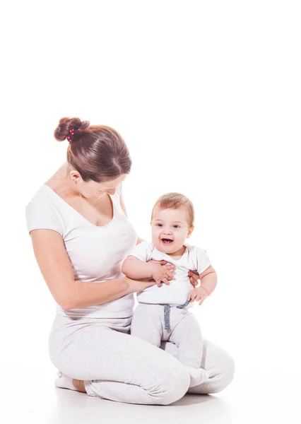 Close up view of attractive young mother with her baby — Stock Photo, Image